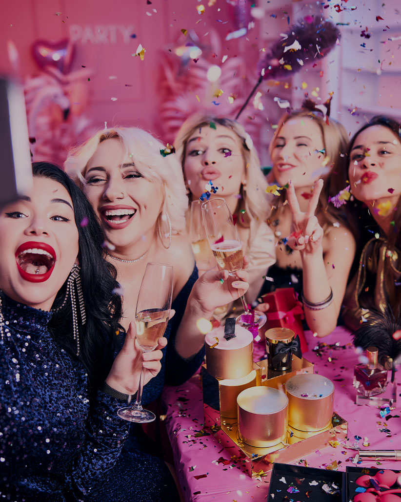 Friends partying at an April Nites sex toy party